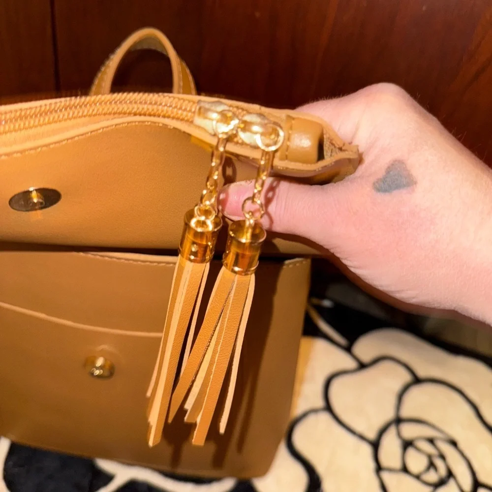 GORGEOUS CAMEL COLOR MINI BACKPACK WITH CONVERTIBLE STRAPS AND ACCENT TASSELS